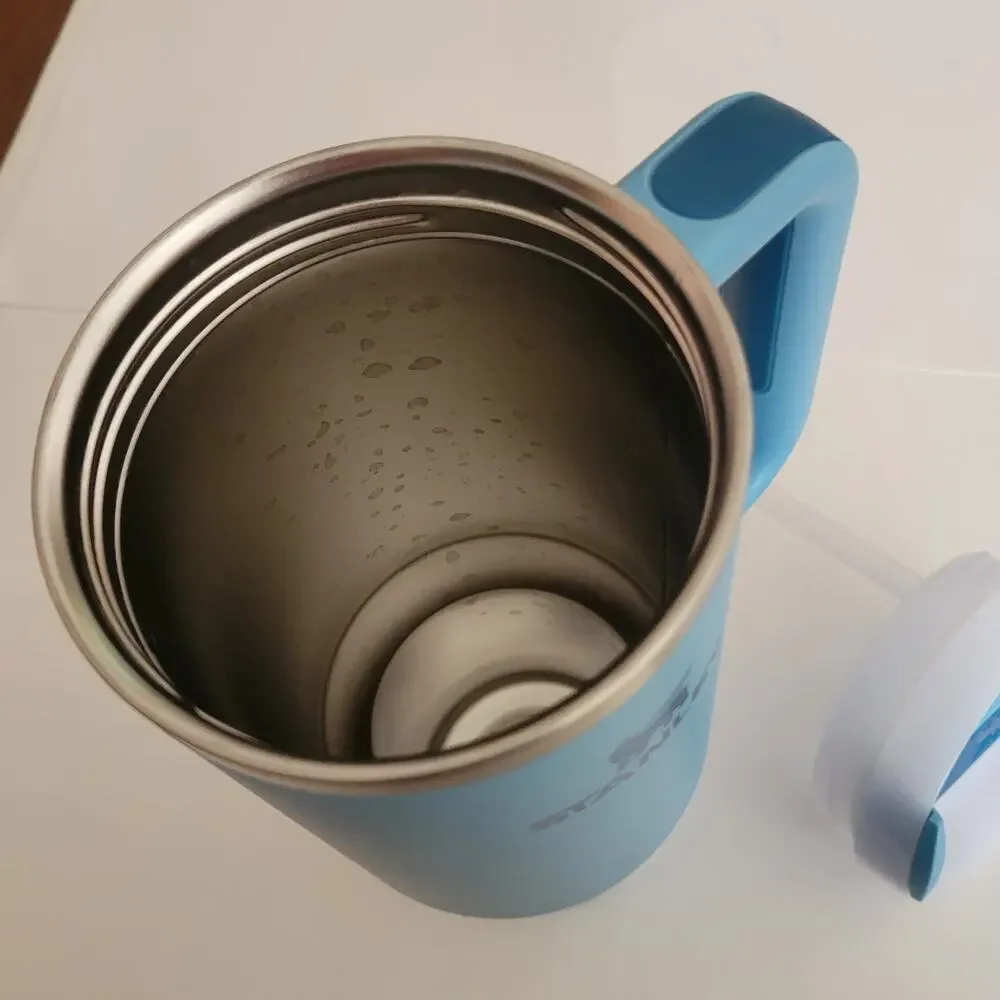 Stanley Quencher H2.0 FlowState Tumbler 40 oz Light Blue Teal with Handle Straw